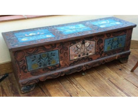 A good Antique trunk with painted decoration to hinged top. Est. £100 - £200.