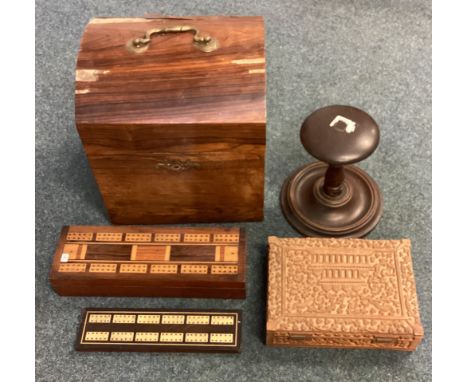 Two rosewood cribbage boards together with a domed top caddy. Est. £20 - £30.