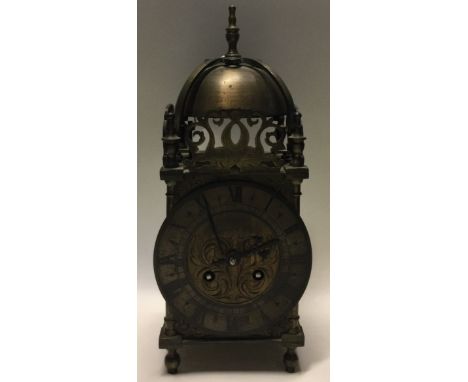 A good brass lantern clock with gilt dial. Retailed by Mappin & Webb. Est. £150 - £250.