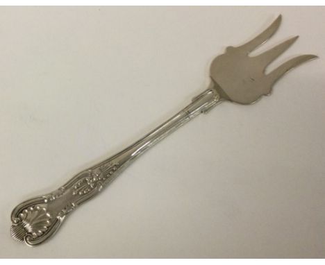 A large silver pickle fork. London 1897. Approx. 65 grams. Est. £50 - £80.
