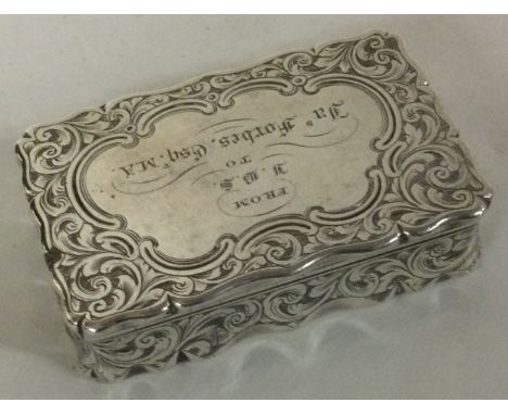 A Victorian silver engraved snuff box. 1860. By Edward Shaw. Approx. 70 grams. Est. £120 - £150.