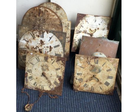 A collection of six painted grandfather clock dials. Est. £30 - £50.