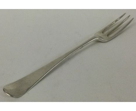 An 18th Century silver three prong fork. London 1766. Approx. 30 grams. Est. £40 - £60.