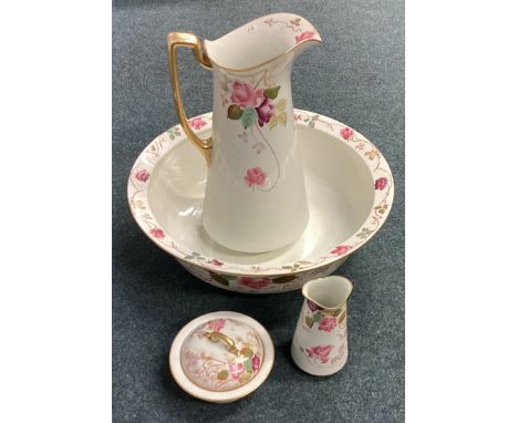 An Ironstone pottery four piece jug and basin set. Est. £20 - £30.