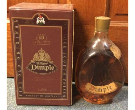 A boxed 1 litre bottle of '15 Years Old' Dimple Blended Scotch Whisky together with a 26 2/3 bottle of Dimple Scotch Whisky. 