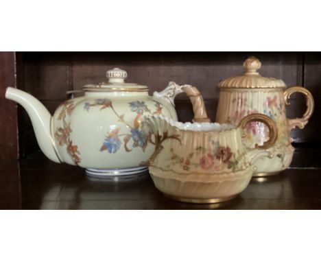 An attractive Royal Worcester teapot of floral design etc. Est. £30 - £50.