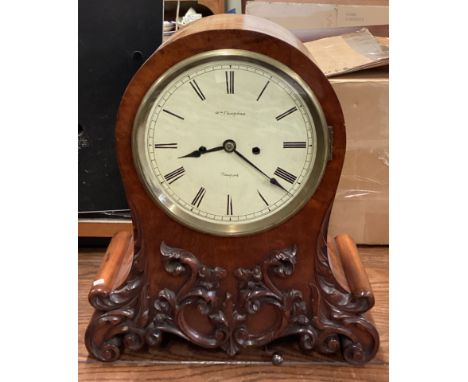 A good quality Victorian mahogany mantle clock with scroll decoration. By William Vaughan. Newport. Est. £250 - £300.