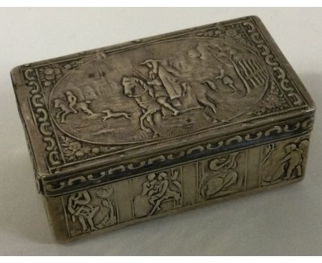 A chased 19th Century German silver hinged snuff box. Marked to rim. Approx. 97 grams. Est. £80 - £120.