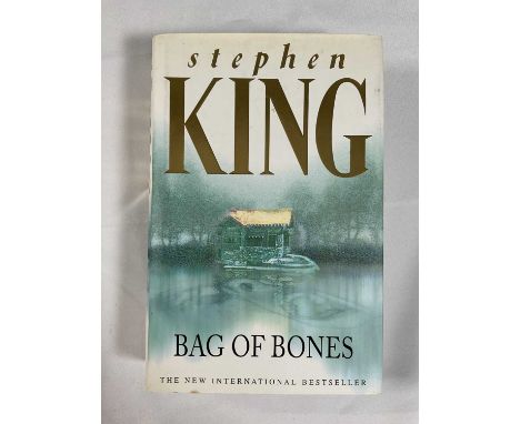 An autographed copy of 'Bag of Bones' limited edition 1222/2000 signed by the author STEPHEN KING to book plate complete with