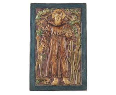 COMPTON POTTERS’ ART GUILD POTTERY PLAQUE OF ST FRANCIS, CIRCA 1920painted in tempera, impressed maker’s mark, 17.5cm high; a