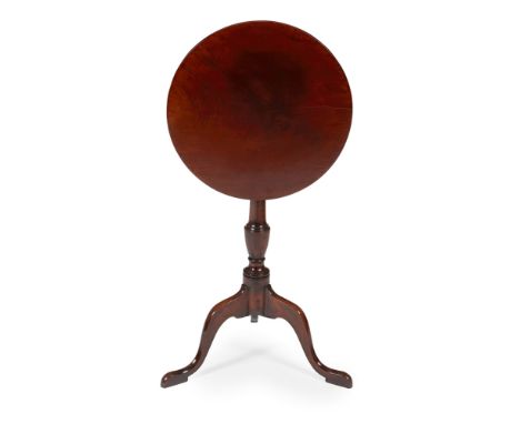 GEORGE III MAHOGANY TILT-TOP WINE TABLE18TH/ EARLY 19TH CENTURYthe plain circular top, raised on a turned baluster column and