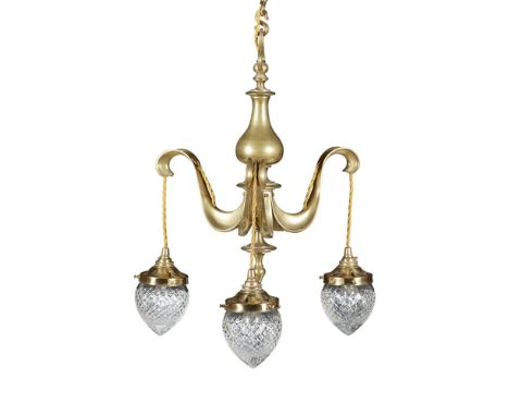 ARTS & CRAFTS BRASS AND CUT GLASS CEILING LIGHT, CIRCA 1900with three curved arms suspending tear-shaped cut glass shades41cm