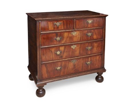 QUEEN ANNE OAK AND WALNUT CHEST OF DRAWERSEARLY 18TH CENTURYthe rectangular moulded top over two short, and three long crossb