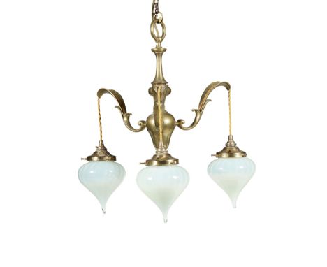 ARTS & CRAFTS BRASS CEILING LIGHT, CIRCA 1900with three scrolling arms suspending light fittings with later opalescent glass 