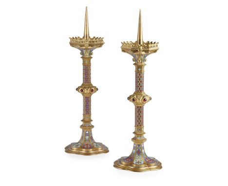 PAIR OF FRENCH GOTHIC REVIVAL GILT BRASS AND CHAMPLEVÉ ENAMEL PRICKET CANDLESTICKSMID-19TH CENTURYwith pierced drip trays imp
