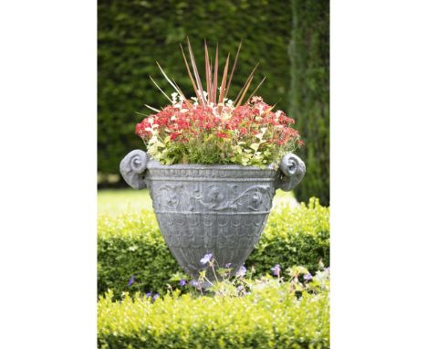 H. CROWTHER, LONDONPAIR OF LARGE CAST LEAD GARDEN URNS, MODERNwith ram's head masks, above friezes of scrolling foliage and f