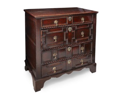 WILLIAM AND MARY OAK CHEST OF DRAWERSEARLY 18TH CENTURYthe rectangular top above four panel-moulded graduated drawers, with b