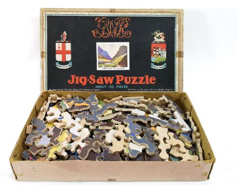 A boxed Tri-Ang Minic Steam roller clockwork toy, 6cm high x 13cm long, and a boxed Chad Valley GWR jigsaw puzzle of the moun