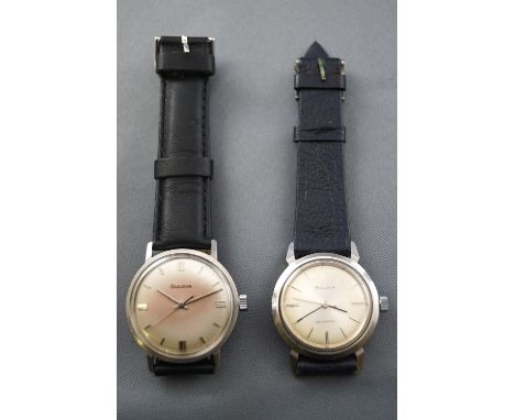 A collection of two manual wind stainless steel wristwatches, by Bulova. Both fitted with black leather straps. Gross weight: