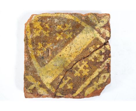 A mediaeval encaustic tile decorated with a coat of arms