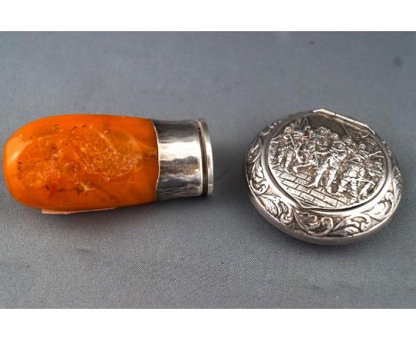 A Continental white metal mounted (stamped 925) desk seal with an amber handle and a small round pinch action (snuff ?) box d