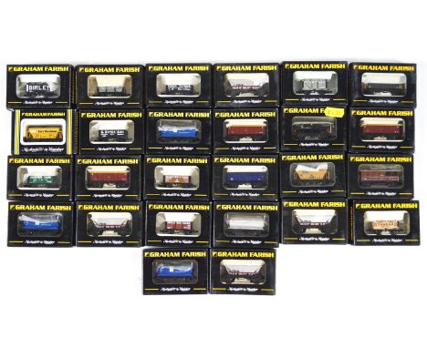 Graham Farish N gauge boxed tenders and rolling stock, one hundred and twelve in total, some duplicates