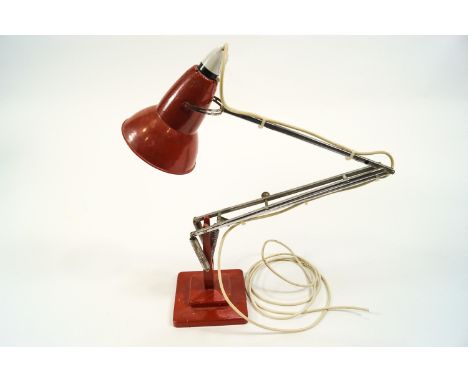 An anglepoise light by Herbert Terry, in rust red, 90cm high