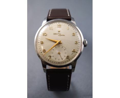 A stainless steel wristwatch by Zenith. Manual wind movement. Case reference: 9177454. Brown leather strap. 36.8 grams
