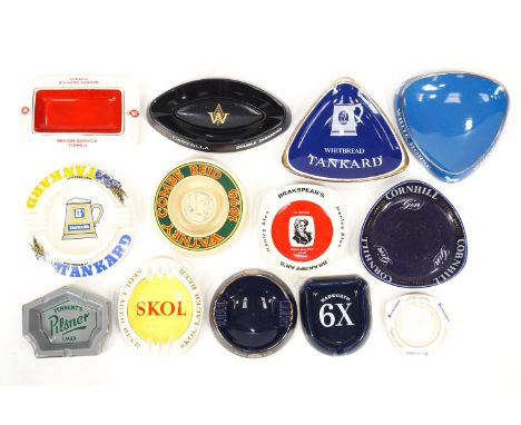 A collection of advertising pub ashtrays, including White Horse Scotch Whiskey, Whitbread, Senior Service and others