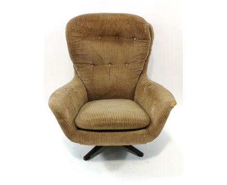 A Swedfurn for MFI swivel armchair with button back