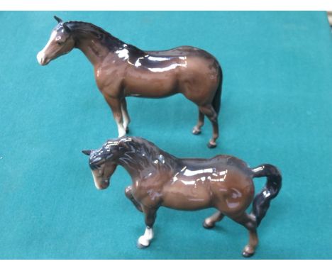 TWO BESWICK GLAZED CERAMIC BROWN HORSES 