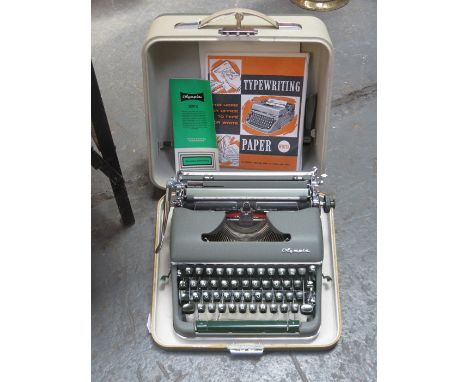 CASED OLYMPIA TYPEWRITER 
