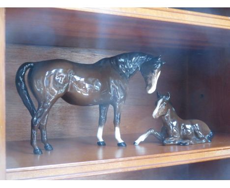 TWO BESWICK GLAZED CERAMIC BROWN HORSES 