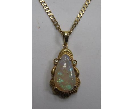 PRETTY 14ct(?) GOLD OPAL SET PENDANT ON 9ct GOLD CHAIN 