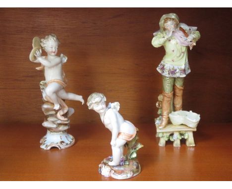 THREE VARIOUS CONTINENTAL GLAZED CERAMIC FIGURES (AT FAULT) 