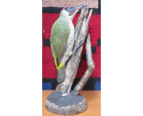 MIKE WOOD, HAND CARVED AND PAINTED TREEN MODEL OF A WOODPECKER, APPROXIMATELY 37cm HIGH