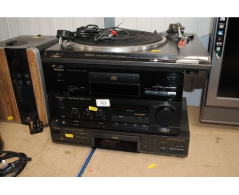 A Technics compact disc player SL-PG3; a Technics stereo integrated amplifier SU-X101; a Technics compact disc player SL-PJ28