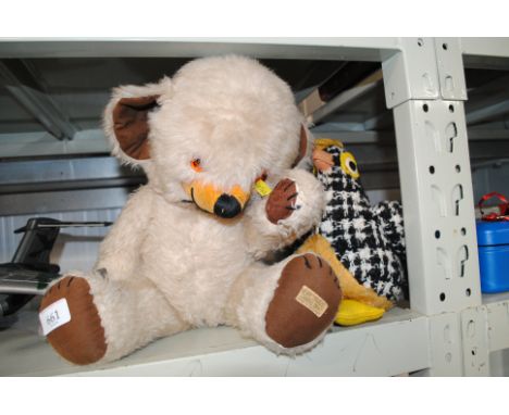 A Merrythought teddy bear and a Brendatoys toy chicken