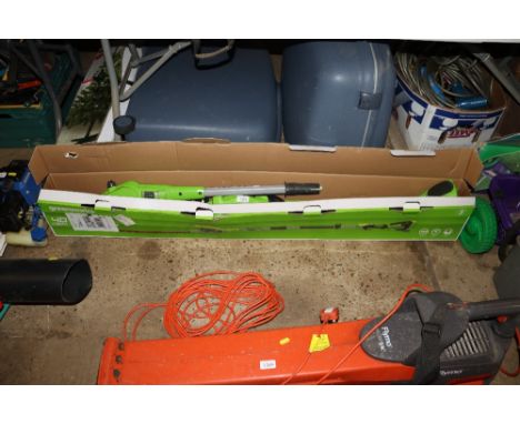 A Greenworks combination pole hedge trimmer / chainsaw