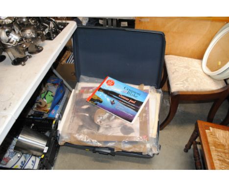 A suitcase containing a large quantity of sketches and prints