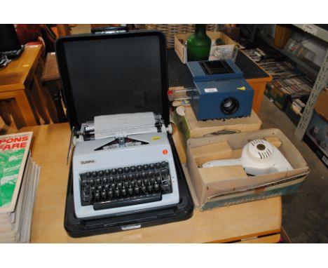 A Boots projector sold as collectors items, A Morphy Richards hairdryer sold as collectors item and an Olympian typewriter