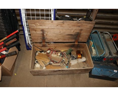 A wooden tool box and contents of various tools