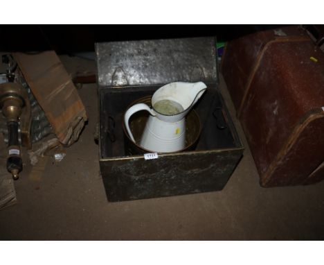 A brass embossed coal box with lion mask handles and an enamel jug etc 