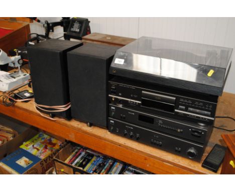 An NAD stereo amplifier 3020E; an NAD stereo tuner 4225; a Technics compact disc player SL-PS620A and Dual record player with