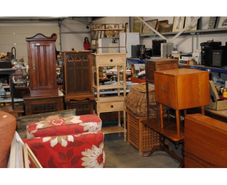 A pair of side tables; each fitted with a single drawer and a metal and wicker shelf