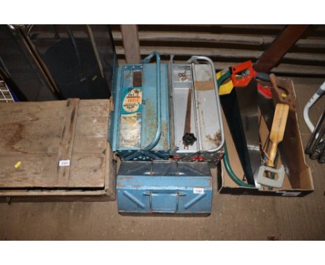 Two cantilever tool boxes and contents and an American style toolbox and contents