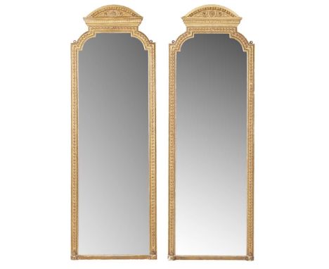  PAIR OF VICTORIAN GILTWOOD PIER MIRRORS LATE 19TH CENTURY with arched pediments with above step-arched mirror plates within 
