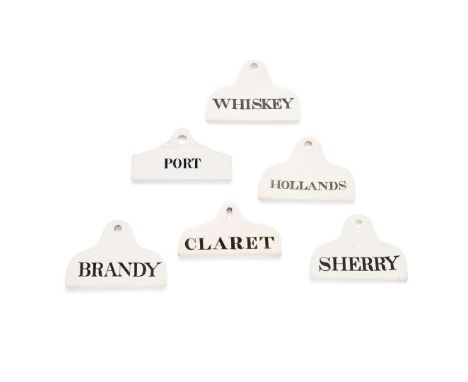  GROUP OF GLAZED POTTERY BIN LABELS 19TH CENTURY comprising three Spode examples SHERRY, WHISKEY, and BRANDY; another unmarke