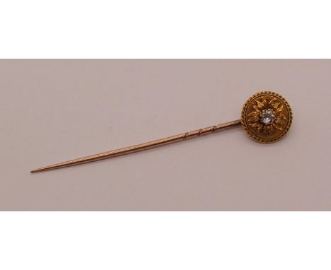 Victorian 18ct stick pin with diamond set terminal, stone 0.20cts approx, 3.2g 