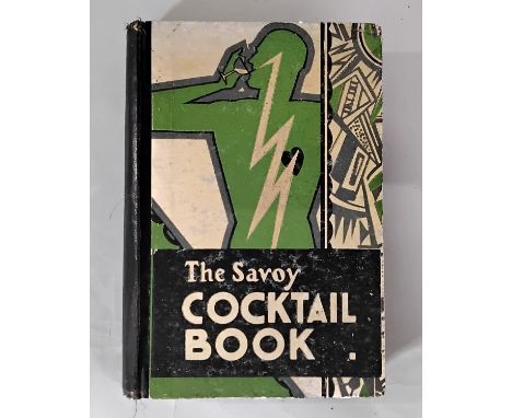 The Savoy Cocktail Book by Harry Craddock, first edition, Constable  &amp; Co Ltd, 1930 (displayed in cabinet upstairs) 